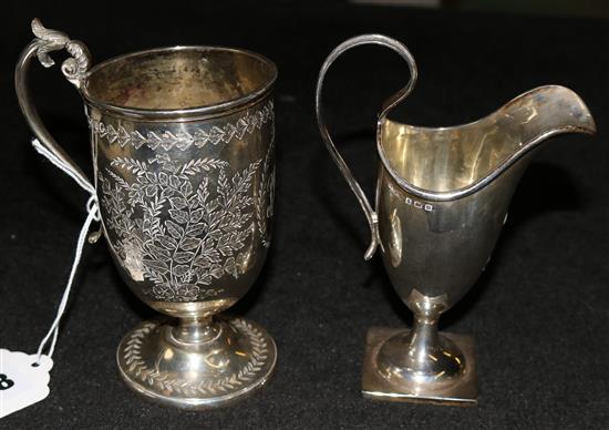 Silver christening mug and cream jug